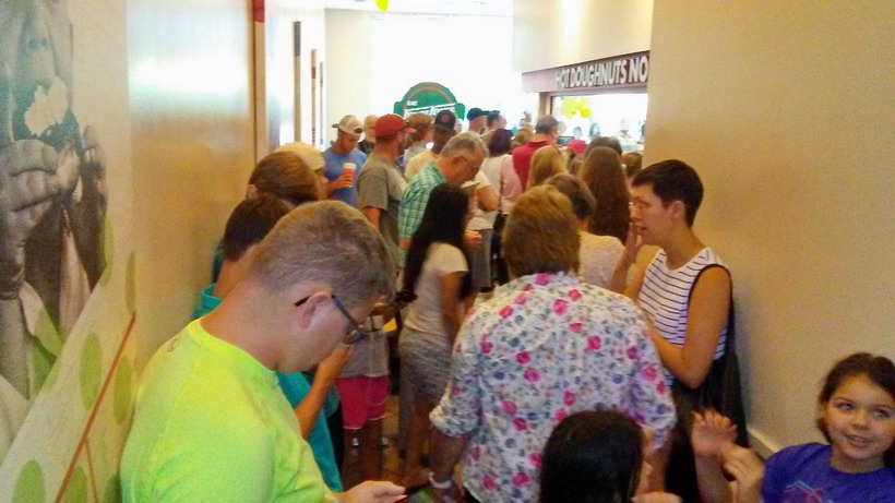 Line up for an eclipse inspired dark glazed Krispy Kreme on the eve of the 2017 eclipse. 