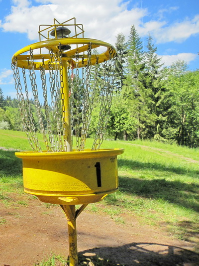 Disc golf basket, photo from EvanLovely on Flicker, through a share license.