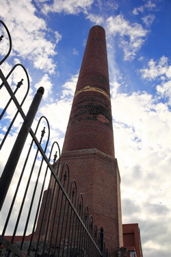 Old industrial stack, still standing in Galveston, Tx.