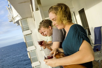 A little wine on the balcony as we depart Cozumel and watch the skies clearing.