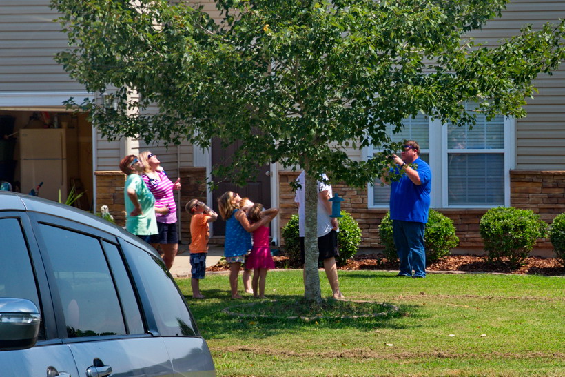 The neighbours all out viewing the point of maximum magnitude.