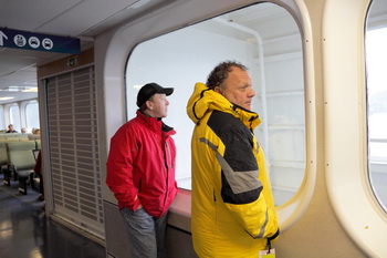 The rain keeps us inside the ferry for the first half of the misty crossing.