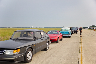 Line up of vehicles waiting to head to the start line.