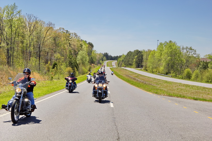 The Thin Blue Line ride, long line of riders behind.