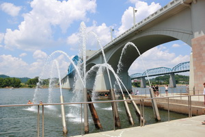 Kayaks playing the water fountains in Chattanooga.