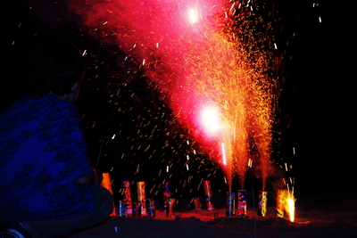 JP helping set off some fireworks.