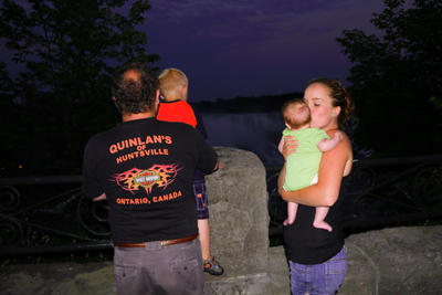 Robin and Jacob and Amber and Audrey checking out the falls as dark just sets in.