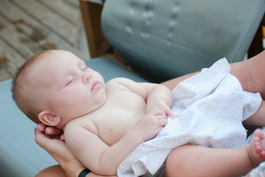 Audrey sleeping in Donna's arms.