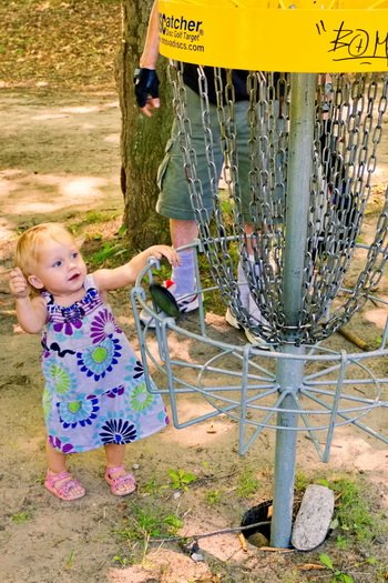A world champion in the making.. better saves these pictures, she could be the Tiger Woods of Disc Golf.