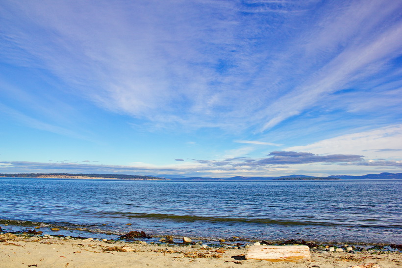 Clouds touch the water.