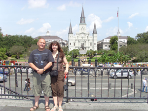 Robin and Lisa in New Orleans, park and cathedral in the background.