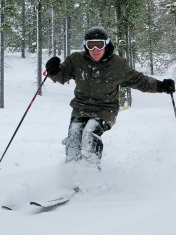 Ronnie coming through a little powder in the trees.