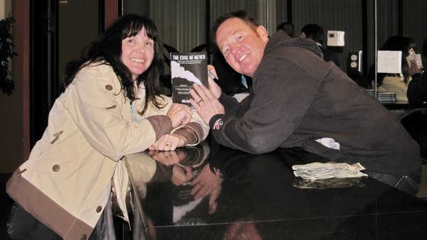 Bill Kerig signs my book for me.